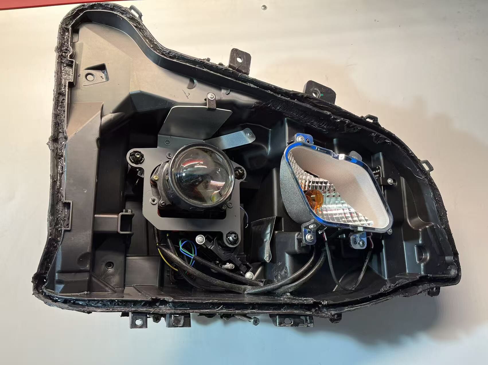 德州伟梵【23-25款蓝擎悦EH /龙H 透镜支架（卤素款）】 安装图解